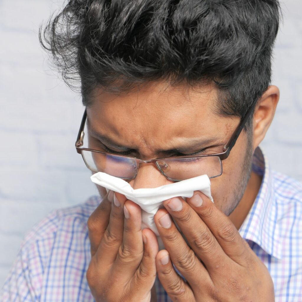 Person blowing their nose