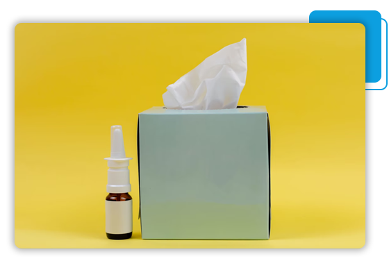 Photo of a tissue box and nasal spray
