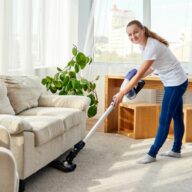 Woman using her vacuum