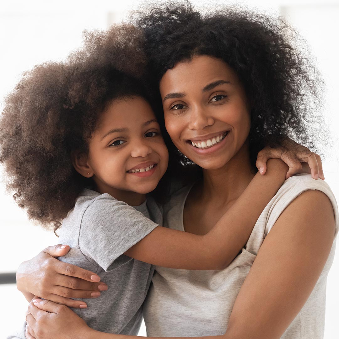 Smiling woman and child