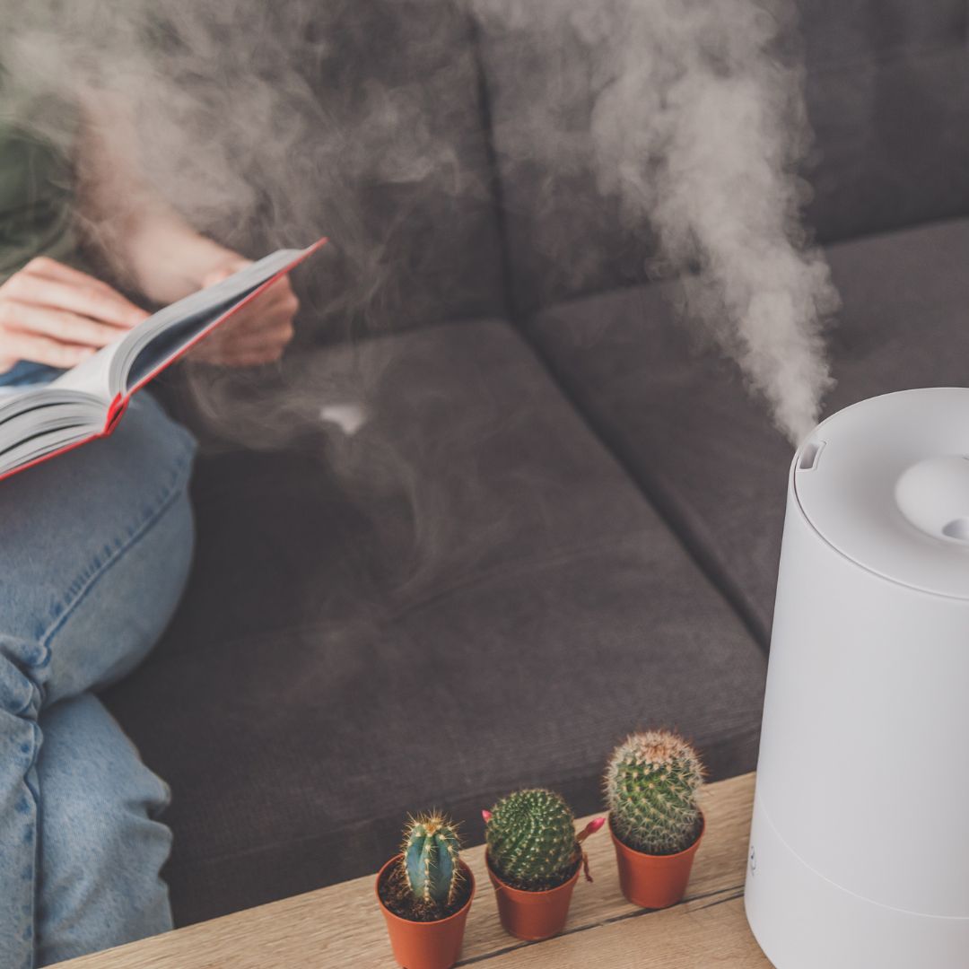 Person next to humidifier