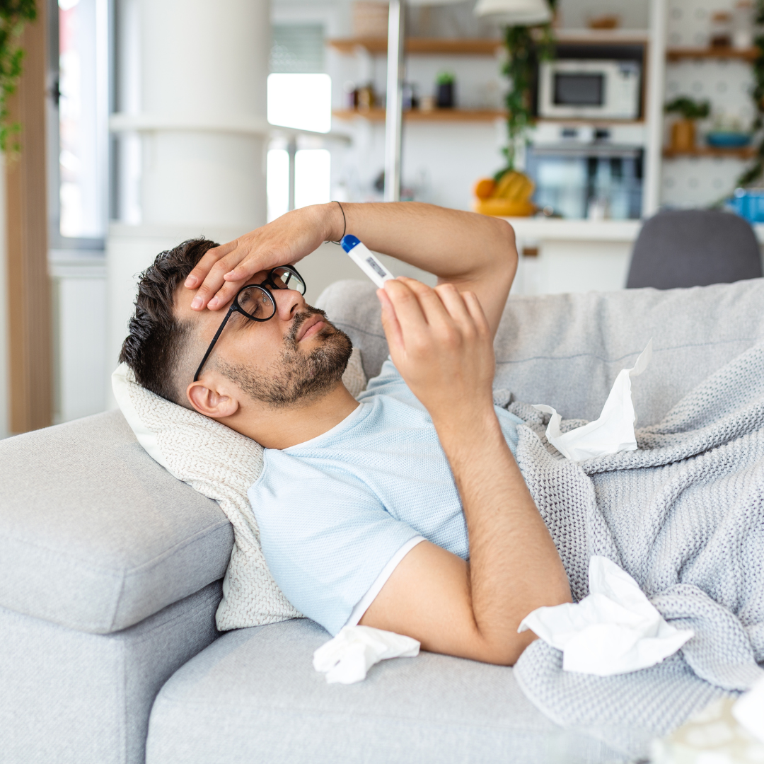 man sick on the couch