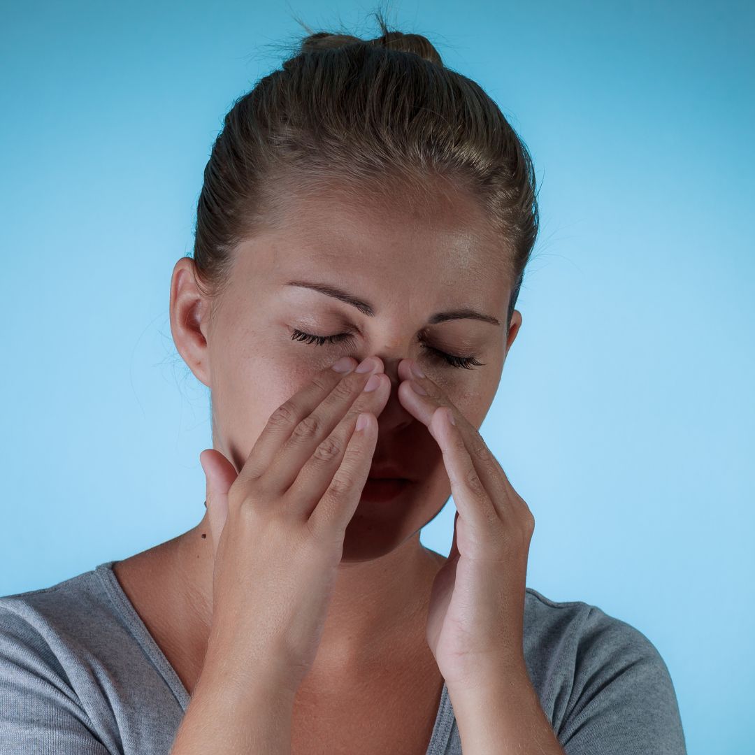 person with sinus pain