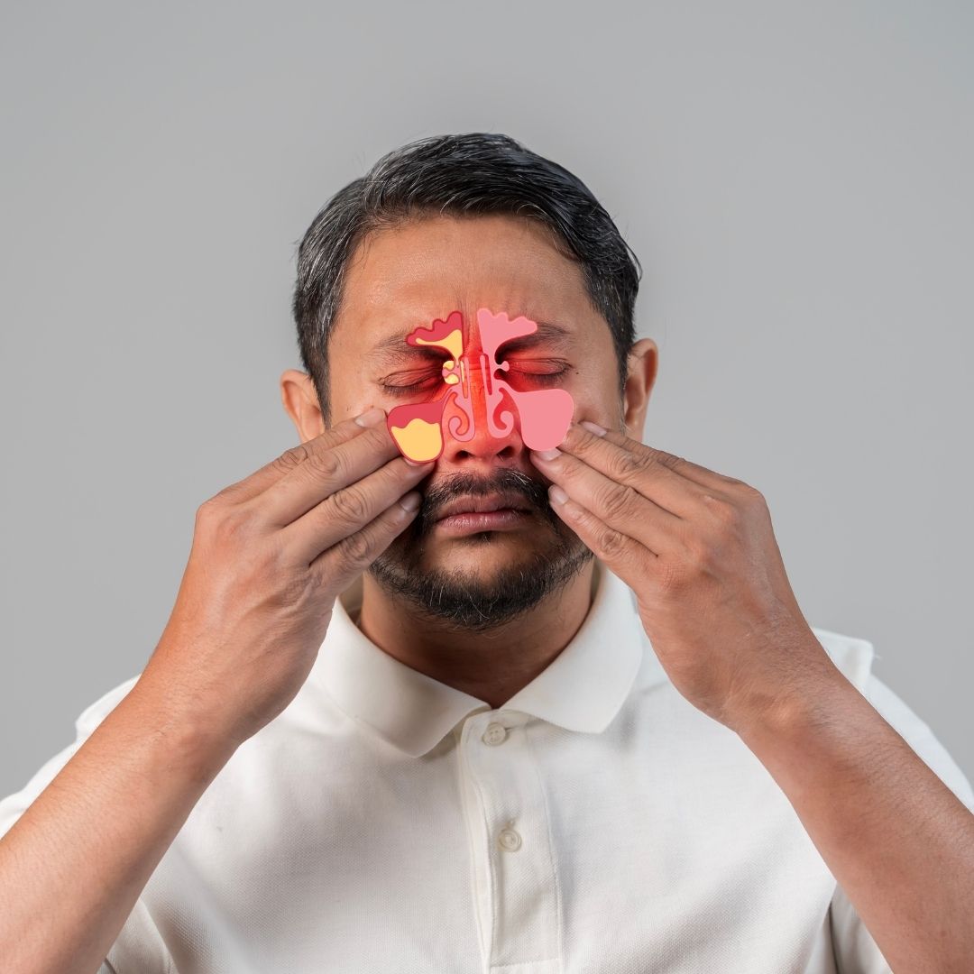 man with sinus pressure